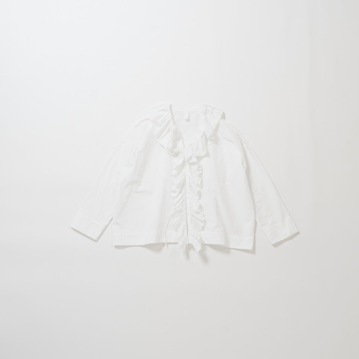 White frilled shirt