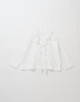 White frilled shirt